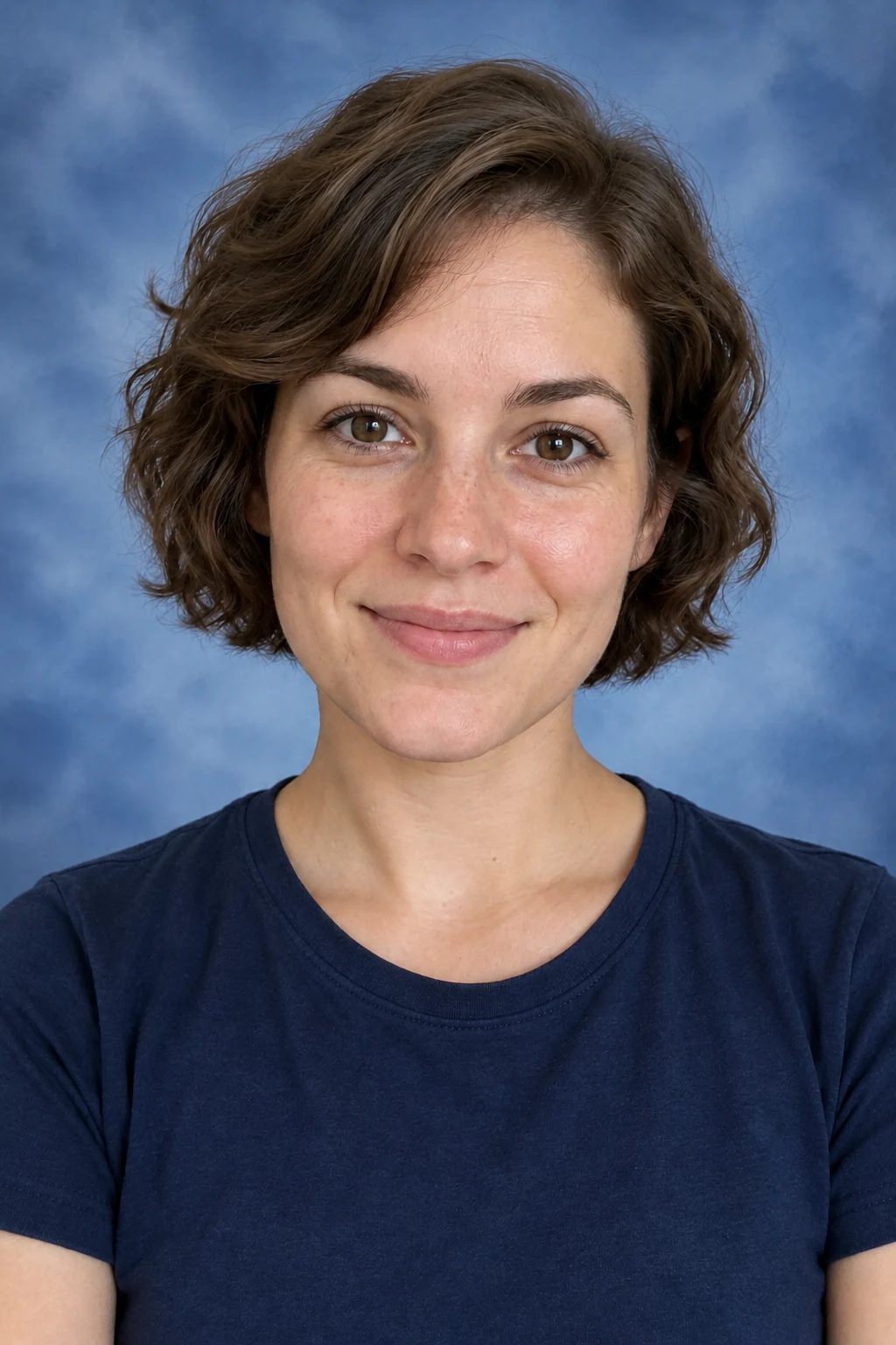 School portrait with a classic blue studio backdrop
